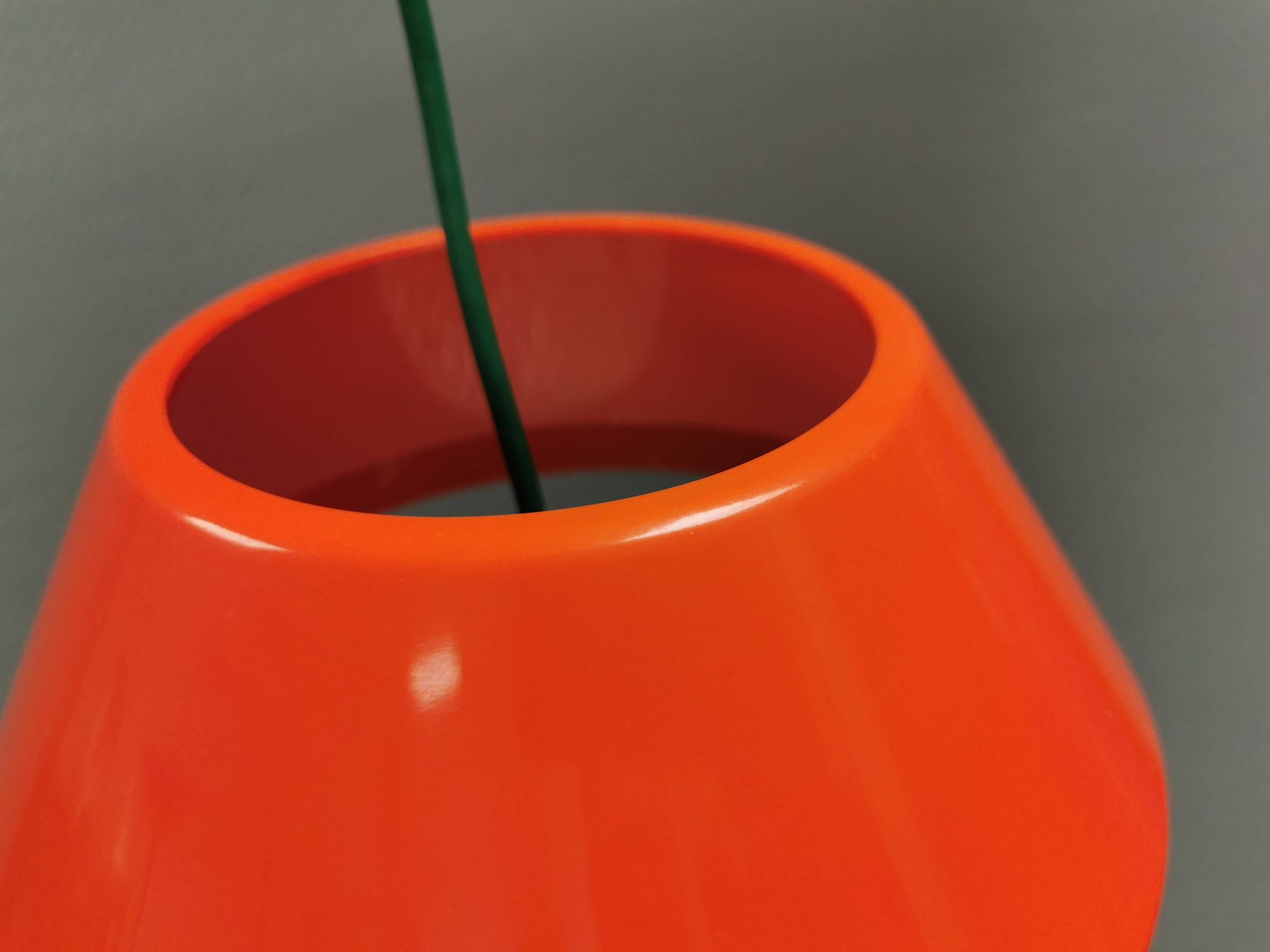 An orange pendant lamp made from hard-pressed ABS plastic. Denmark 1970s