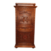 Antique carved oak wardrobe – figurative scene – late 19th century