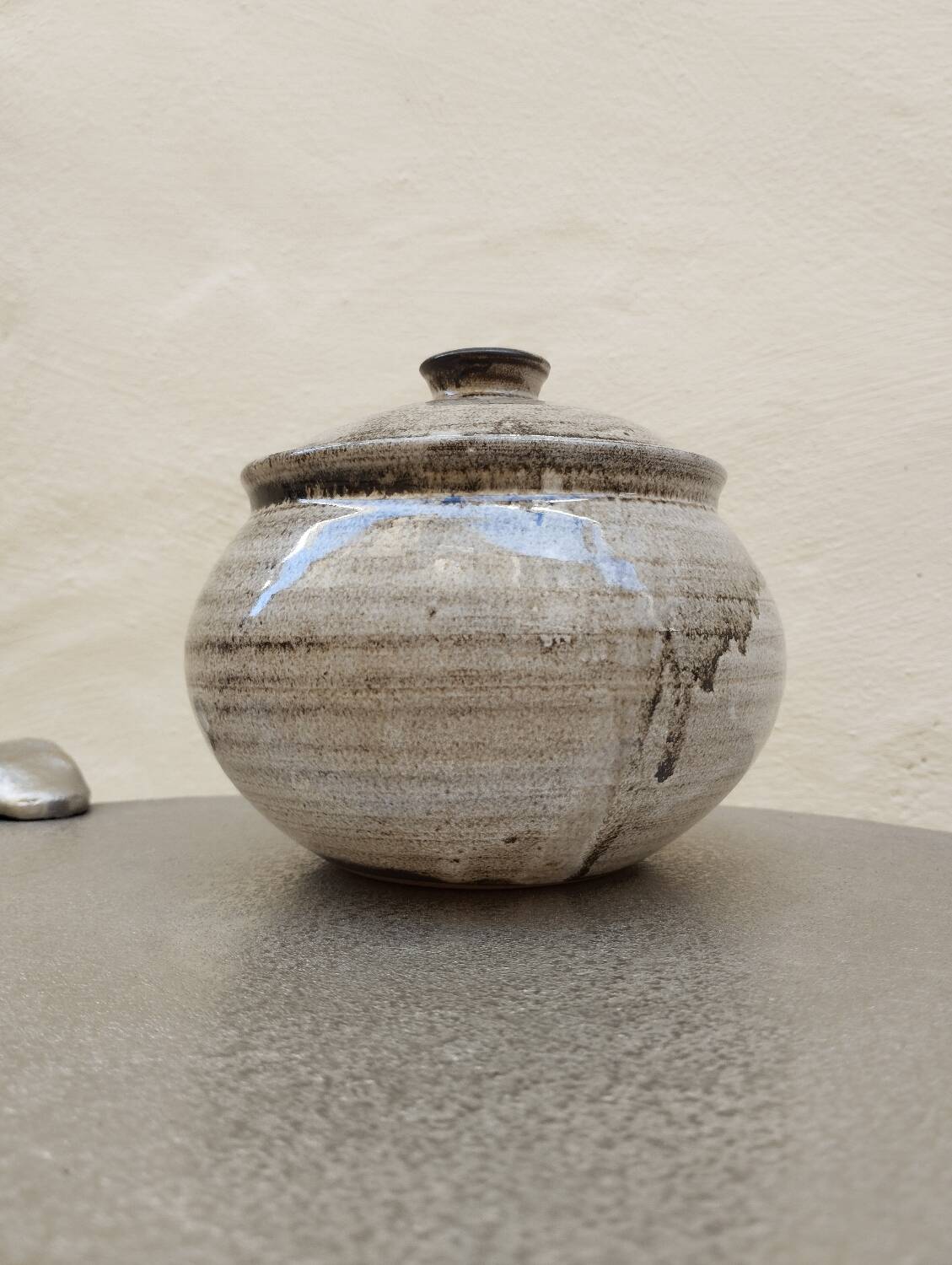 Covered enameled earthenware pot