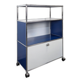 Meuble USM Haller bleu gentiane et blanc à porte abattante sur roulettes