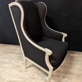 Pair of Louis XVI armchairs with ears in grey painted wood and black fabric