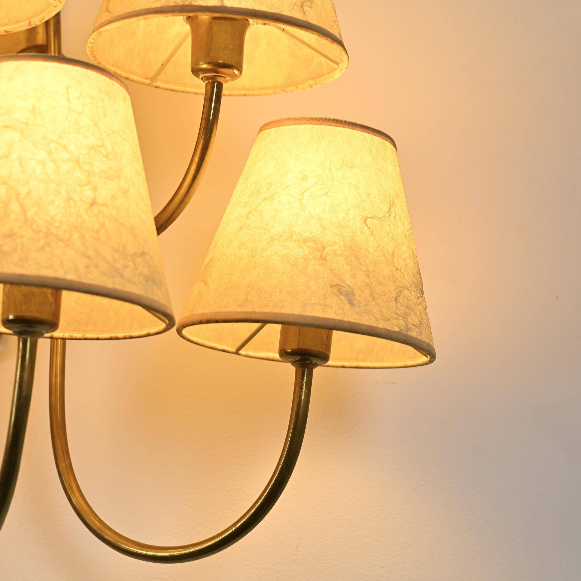 Wall sconce with nine arms in brass, France, circa 1950.