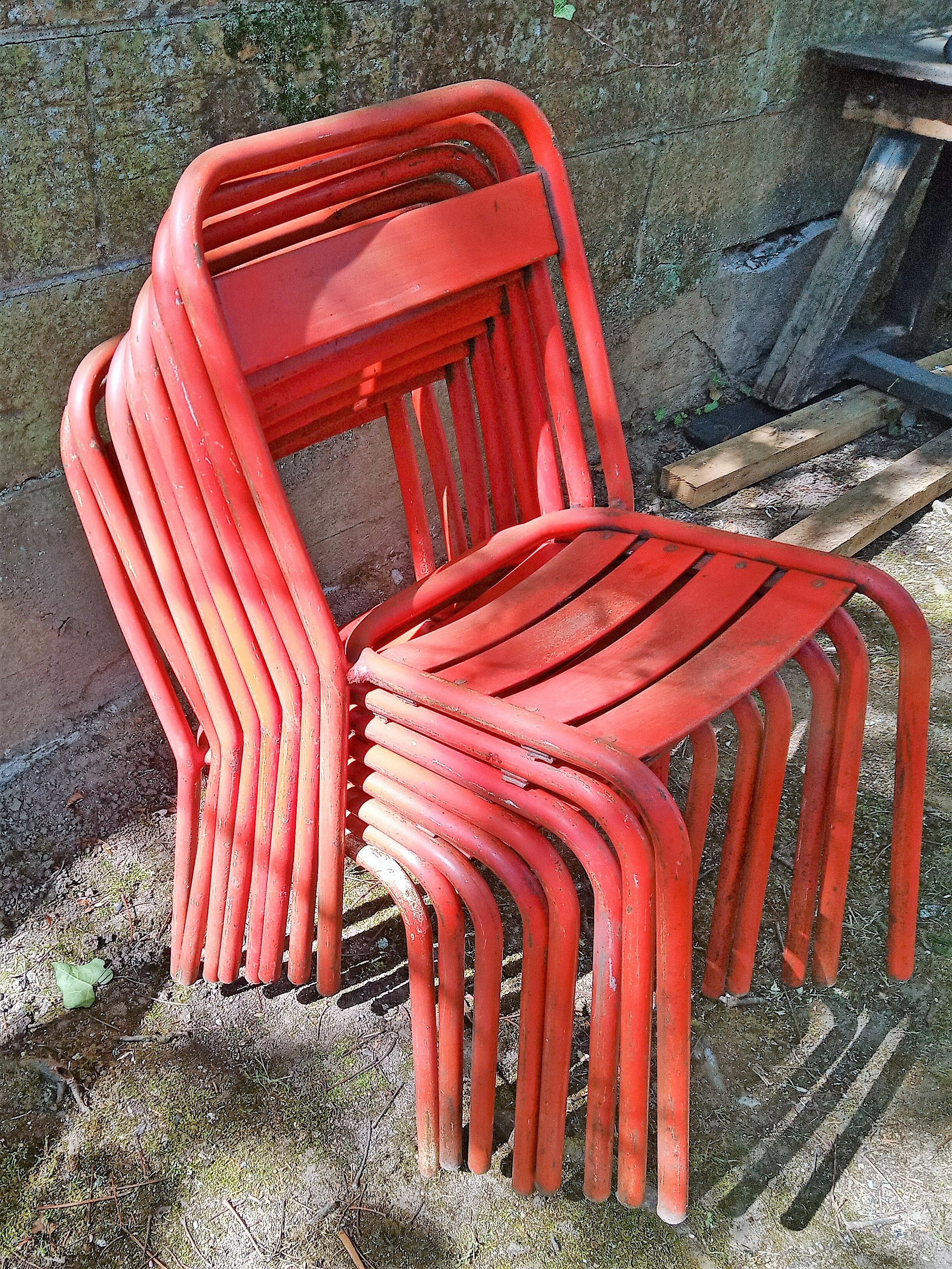Series of 8 red Tolix chairs
