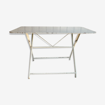 White folding metal bistro table