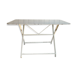 White folding metal bistro table