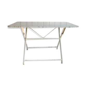 White folding metal bistro table