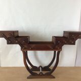 Worker on wooden feet