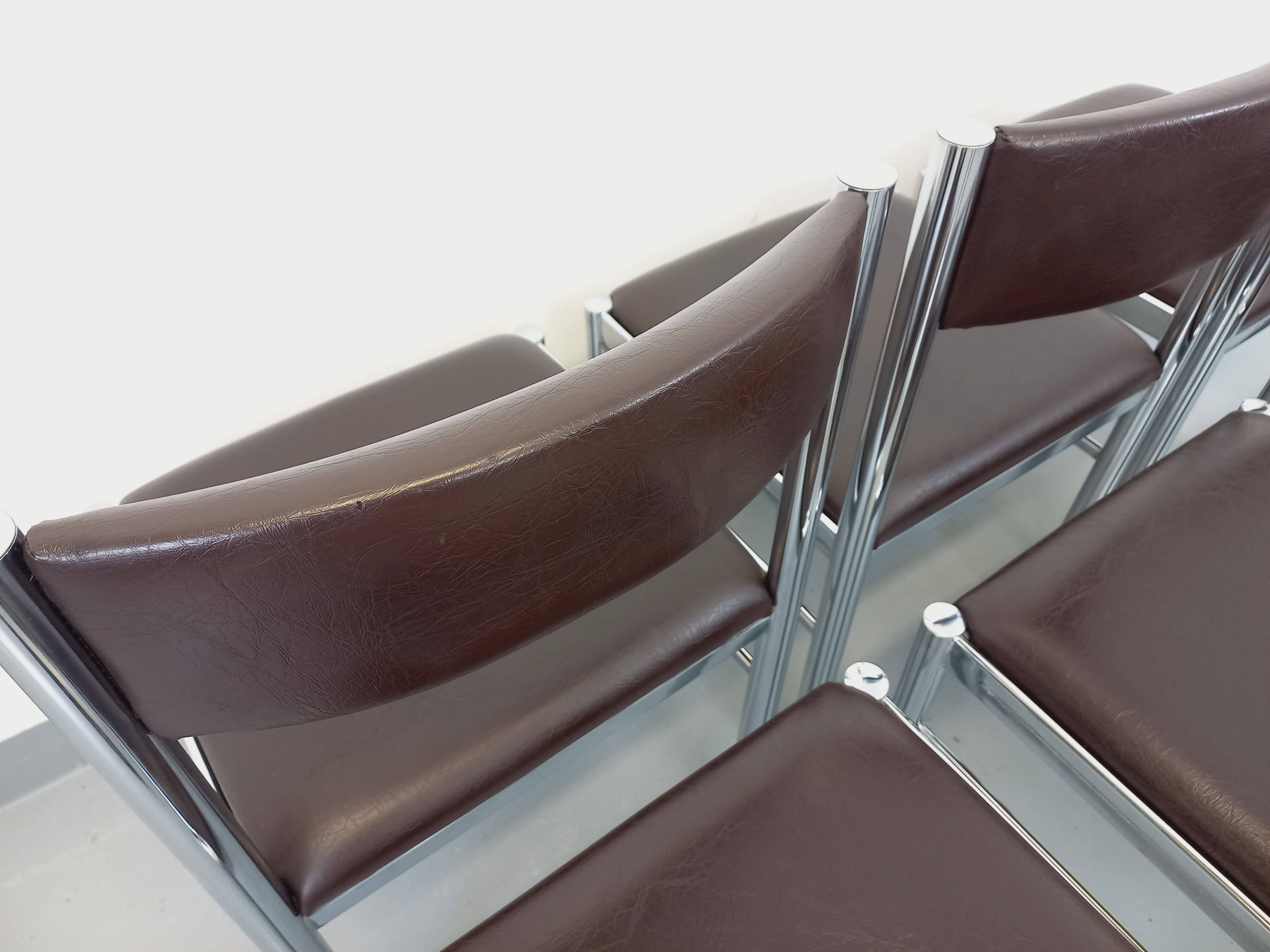 Set of 6 vintage chairs from the 70s in chrome metal and brown faux leather.