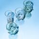 pair of green glass champagne flutes - points