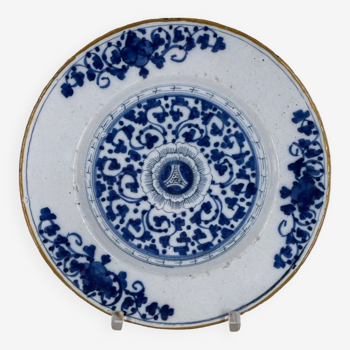 18th century Delft blue earthenware plate decorated with flowers
