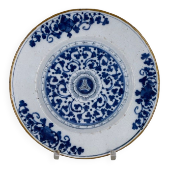 18th century Delft blue earthenware plate decorated with flowers
