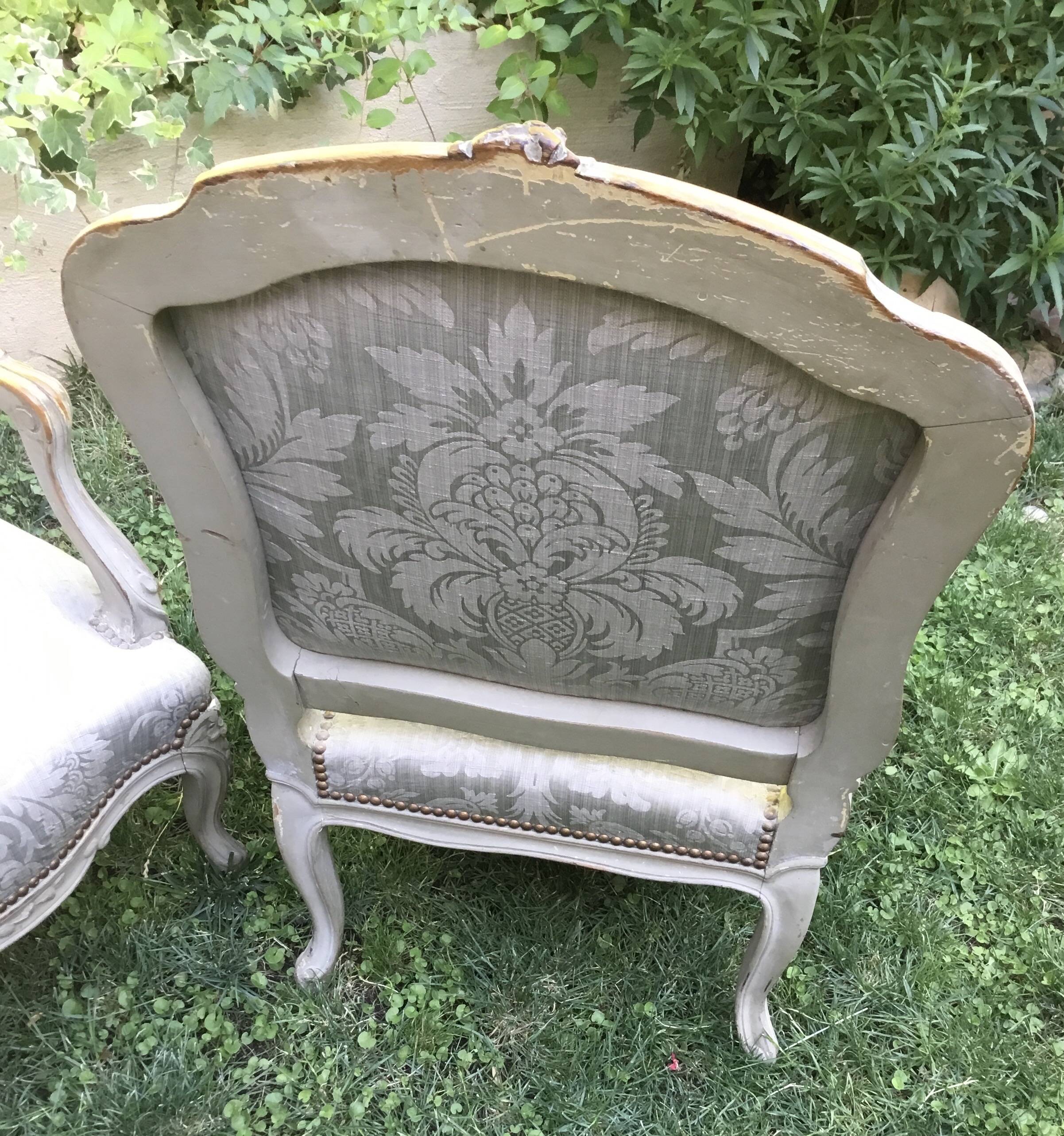 Pair of Louis XV style armchairs in grey lacquered wood.