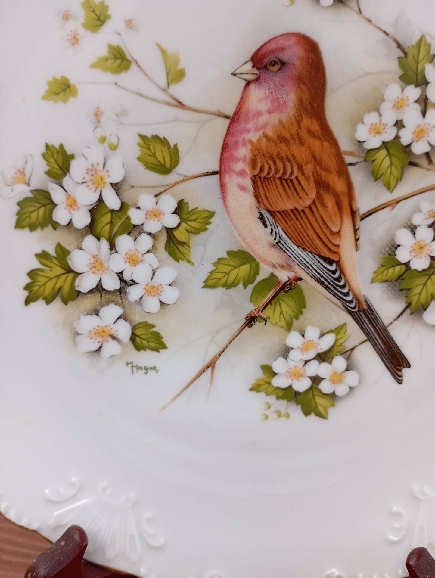 Two Limoges porcelain plates signed M. Hague.