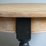 Round table in coloured cerused oak, waxed coloured feet