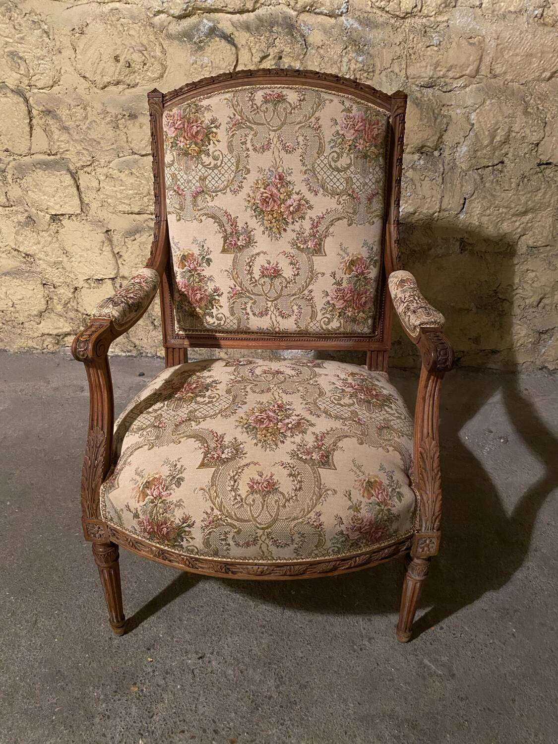 Pair of antique carved wooden armchairs