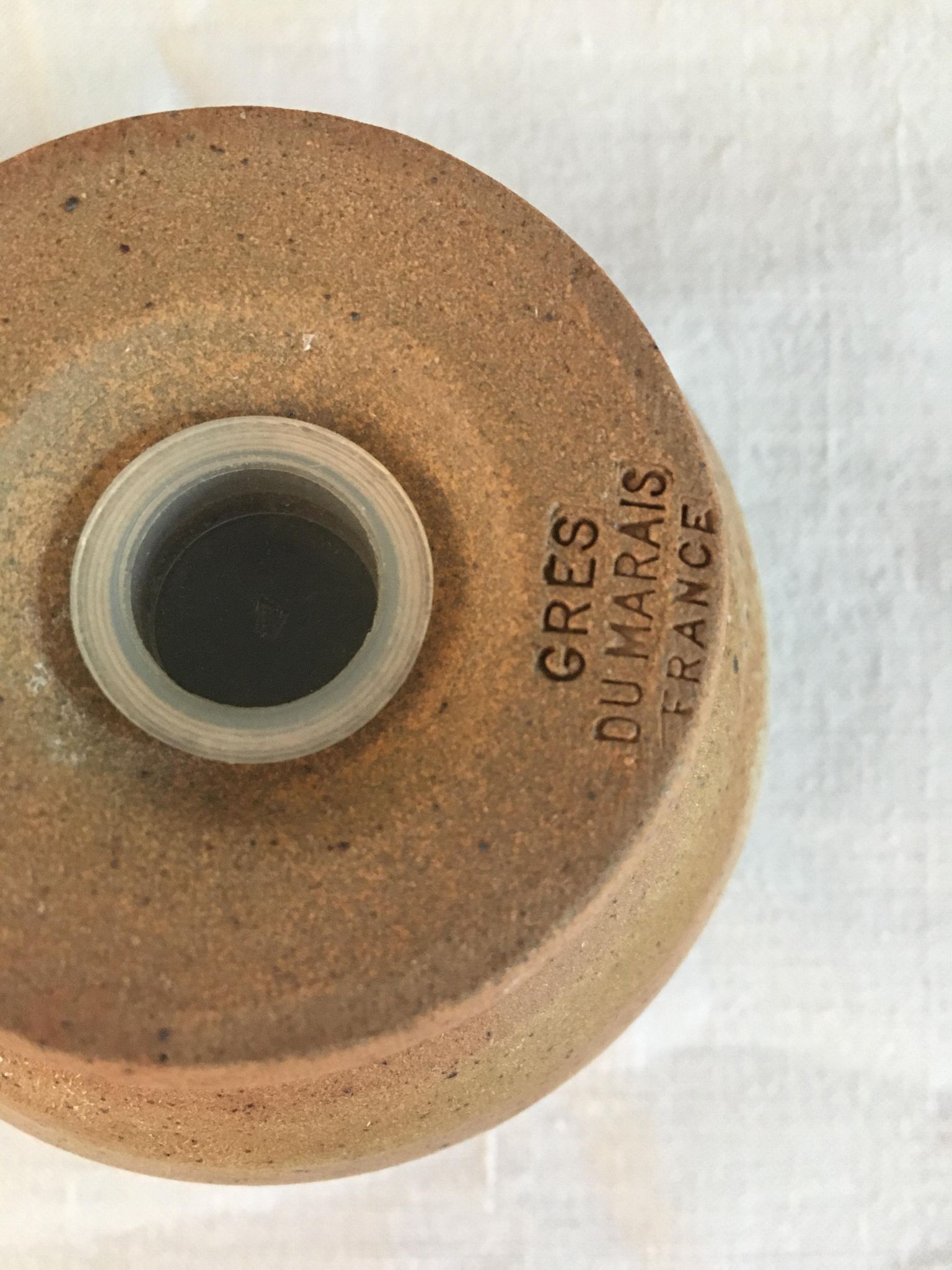 Vintage salt and pepper shaker in sandstone
