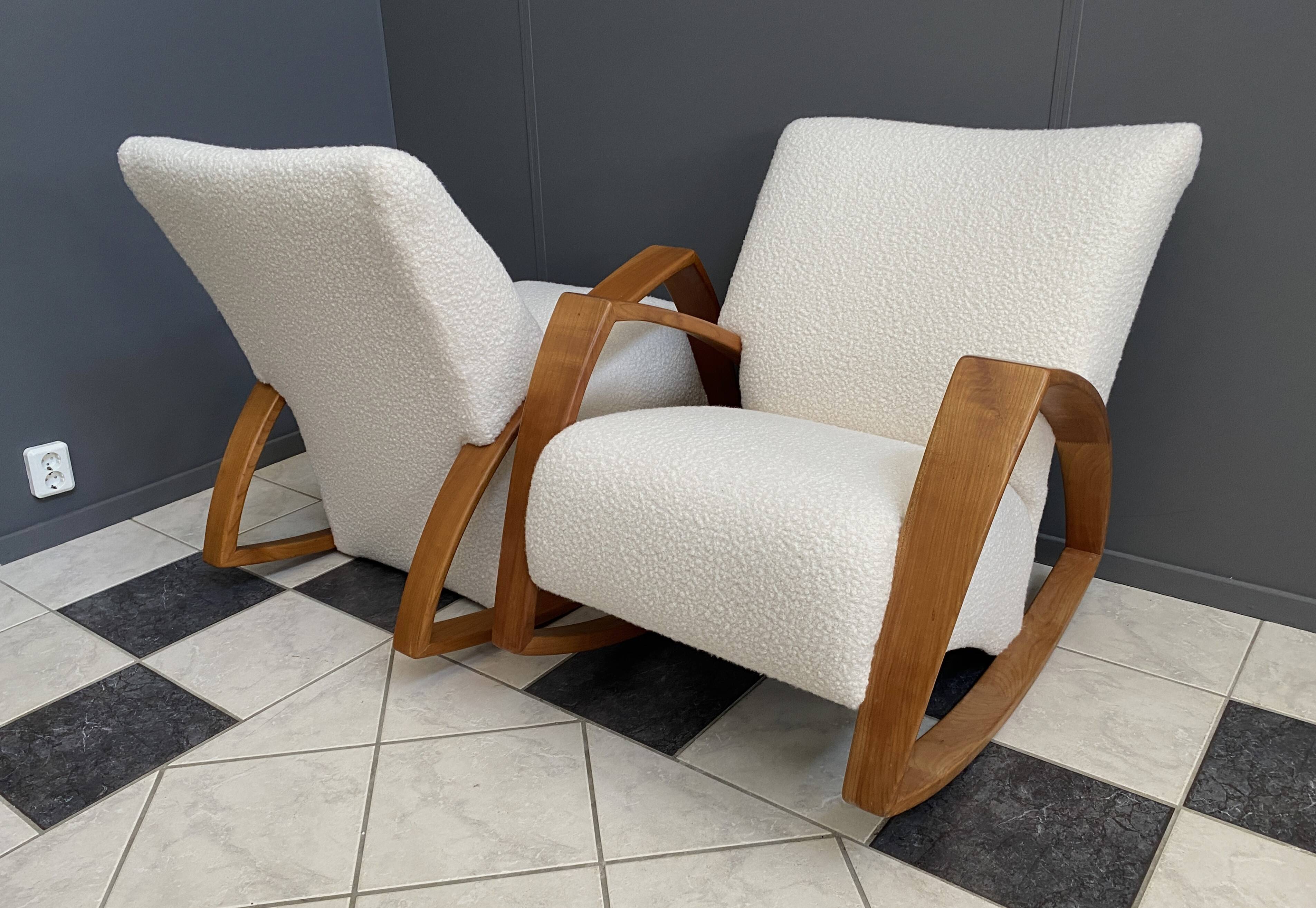Pair of large rocking chairs reupholstered in White Boucle