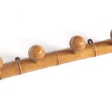 Light wood coat hooks 1900