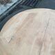 Round extendable dining table with a central pedestal base, renovated in raw wood, 150cm