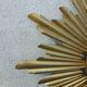 Gold metal sun mirror