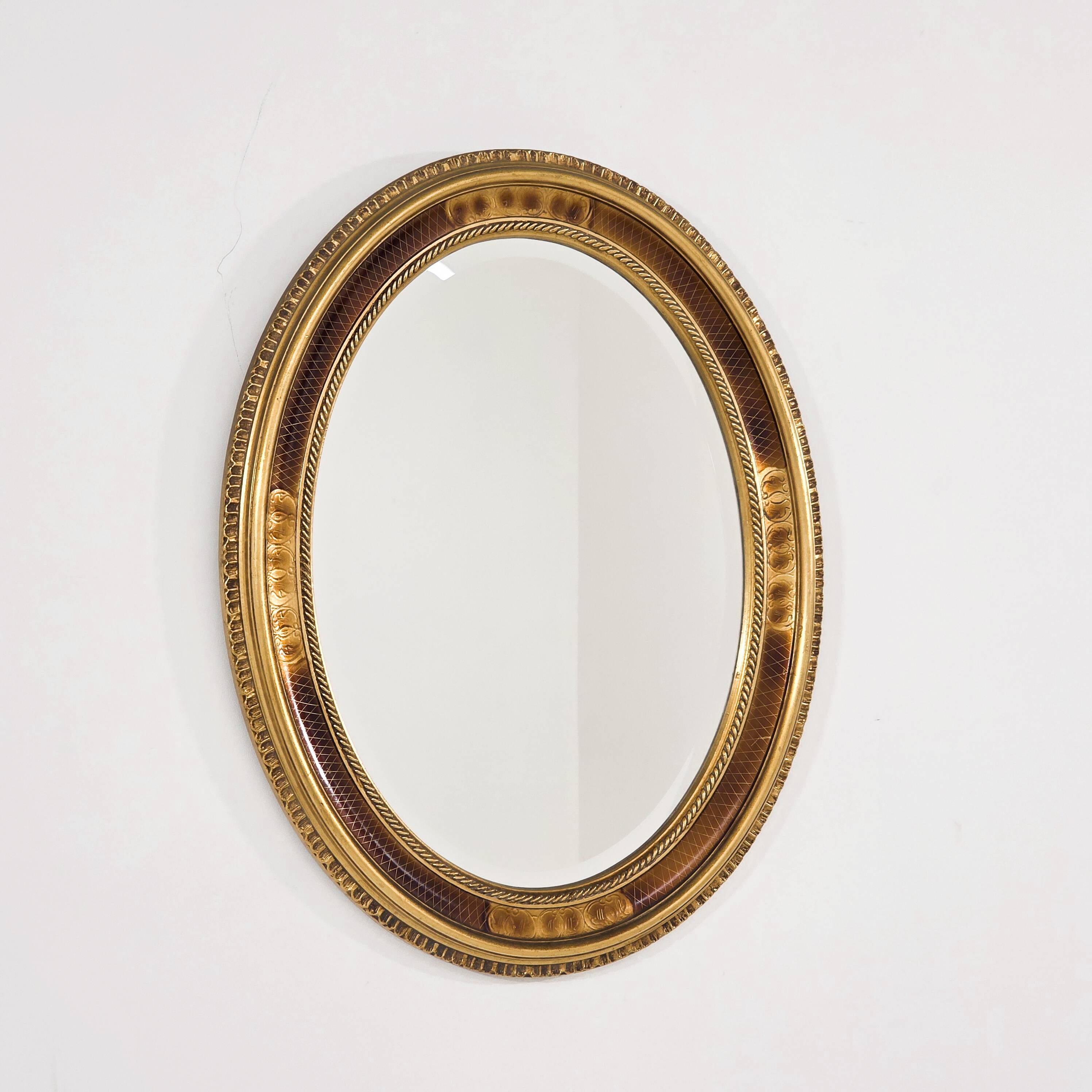 Paire de miroirs médaillon de style Louis XV