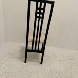8 black lacquered chairs