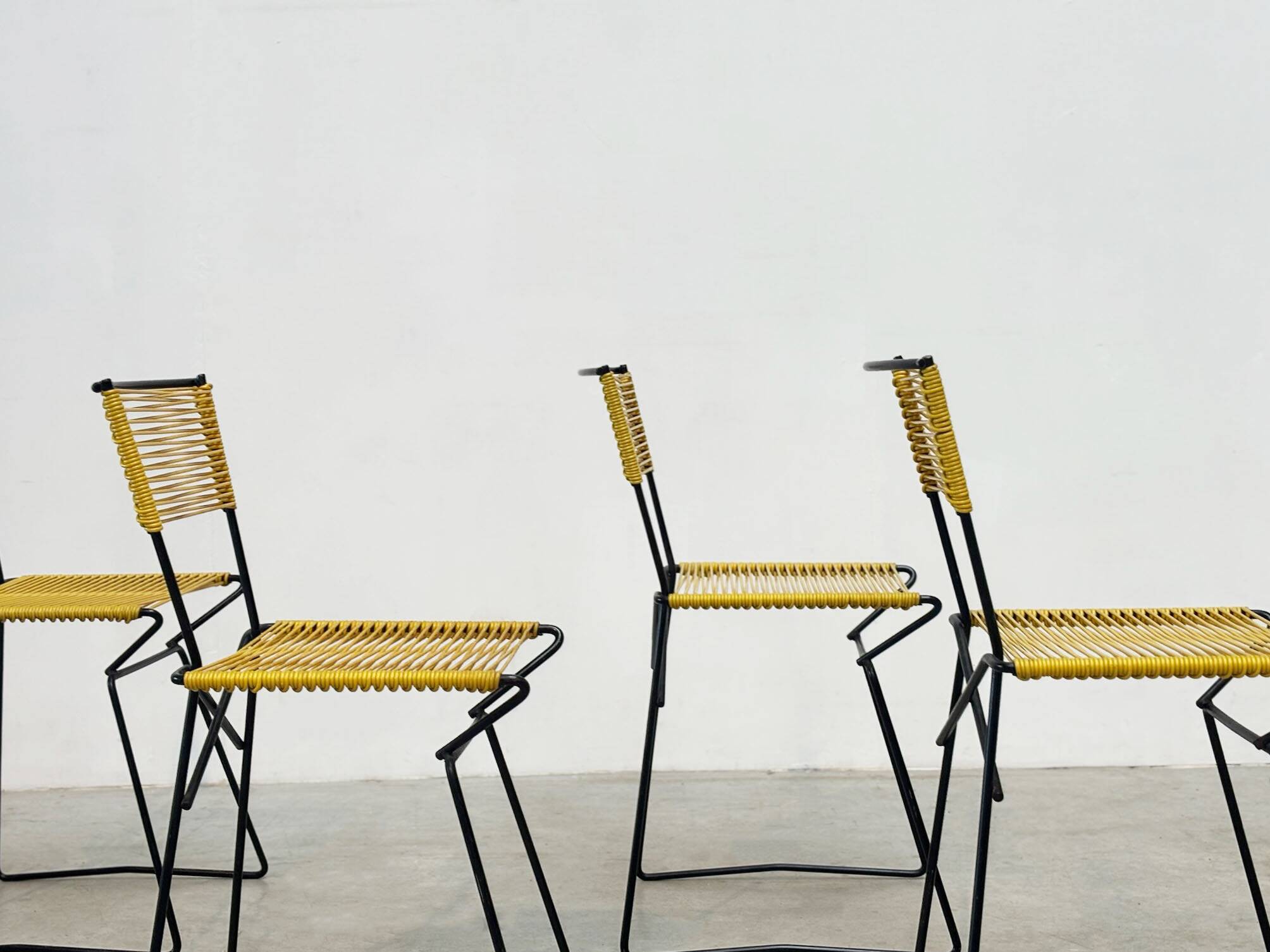 Set of six 'Spaghetti' dining chairs