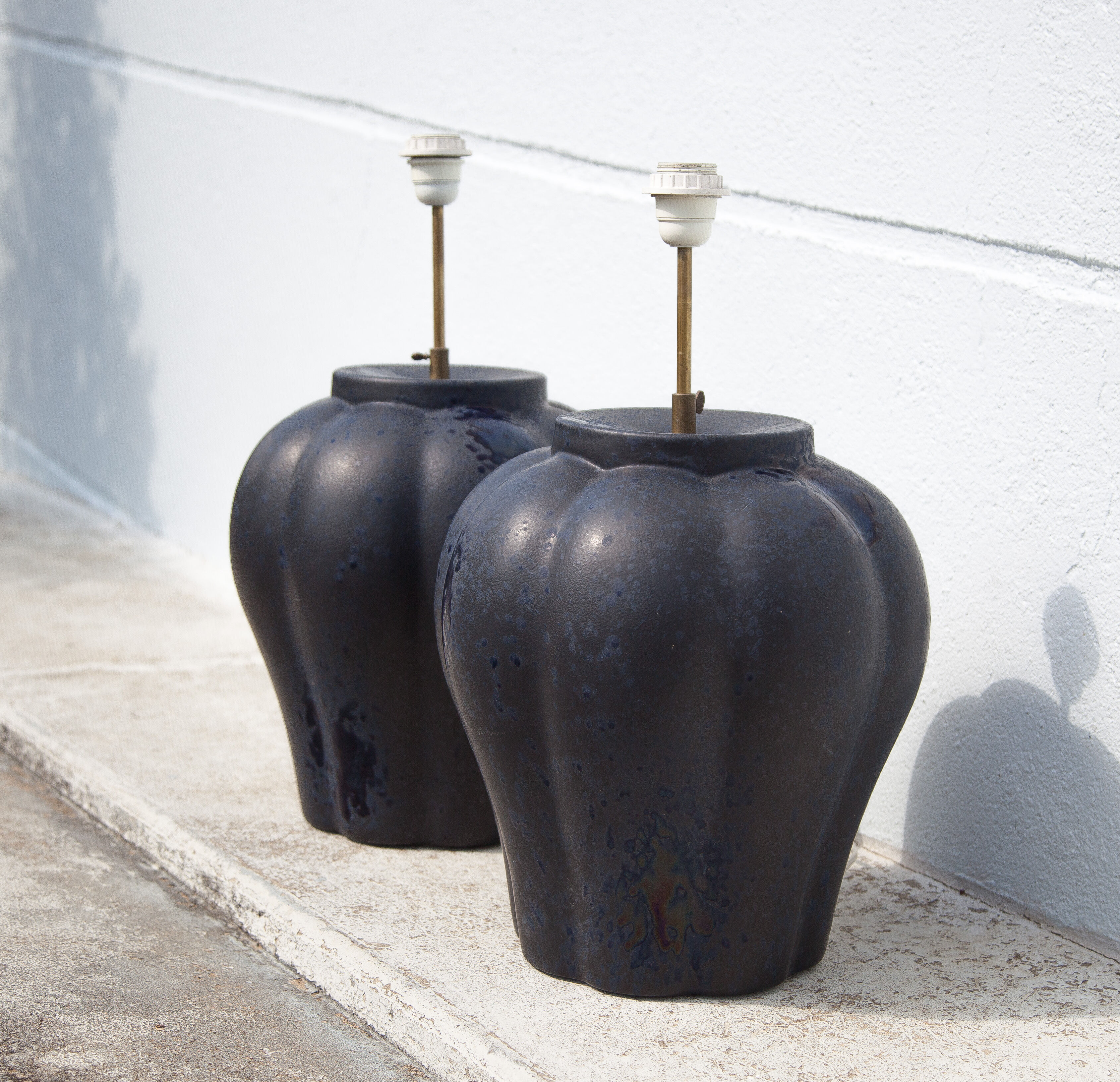 Pair of midnight blue ceramic lamps
