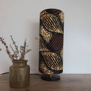 Tube lamp with wooden base and wax boho-ethnic fabric