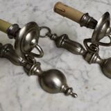 Pair of pewter-colored bronze wall sconces