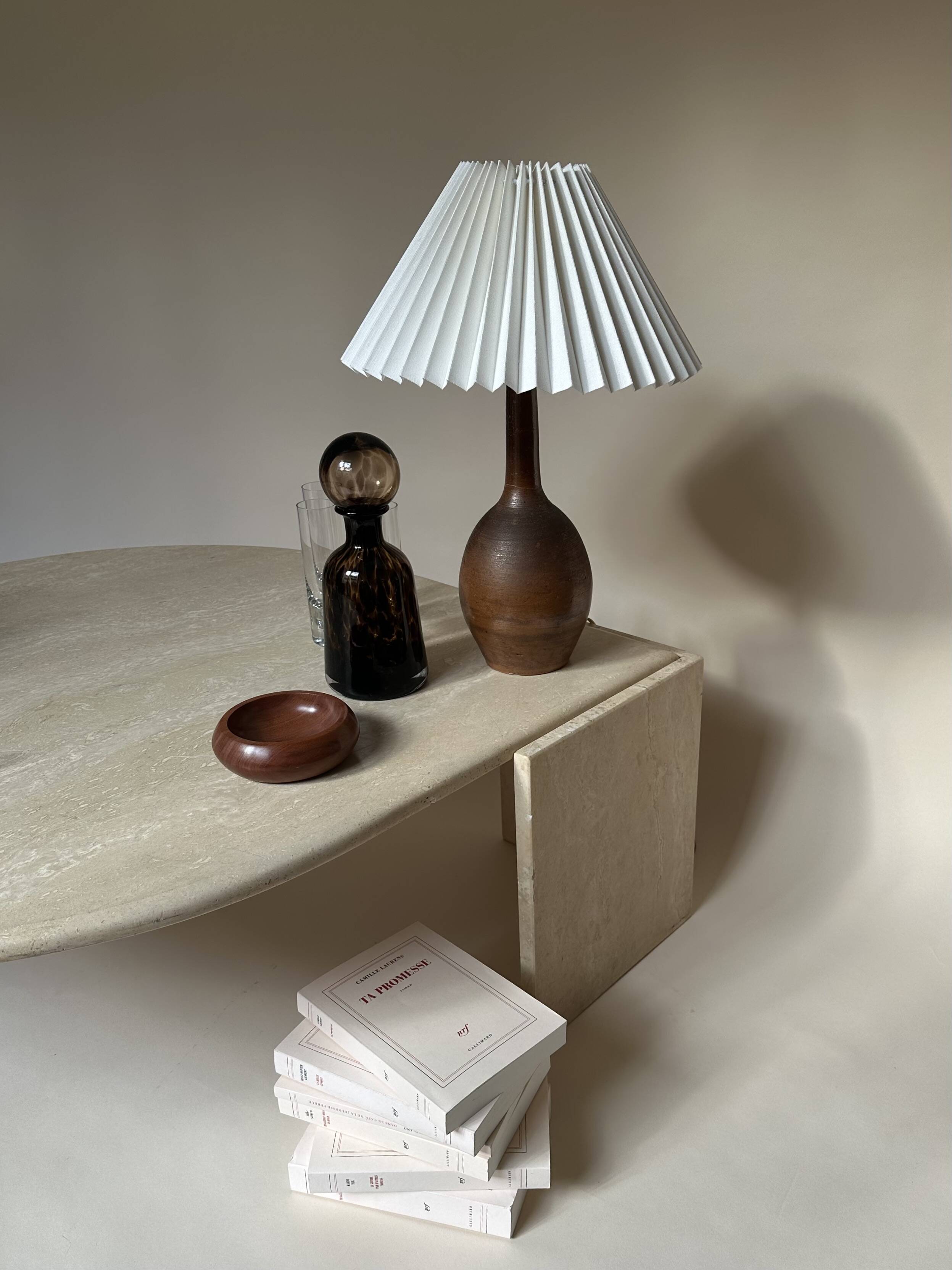 Travertine eye-shaped coffee table