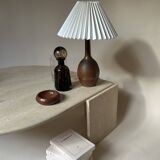 Travertine eye-shaped coffee table