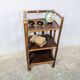 Small rattan and wood shelf