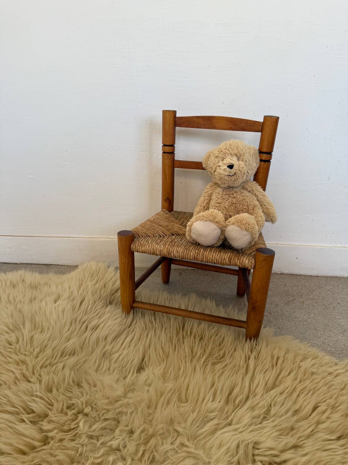Vintage wooden and straw children's chair