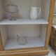 Raw wood craft furniture, pearl gray interior.