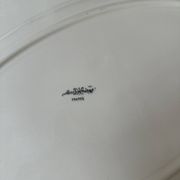 Shaped plates and dishes in Sarreguemines earthenware.