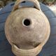 Ancient sandstone jar with two handles