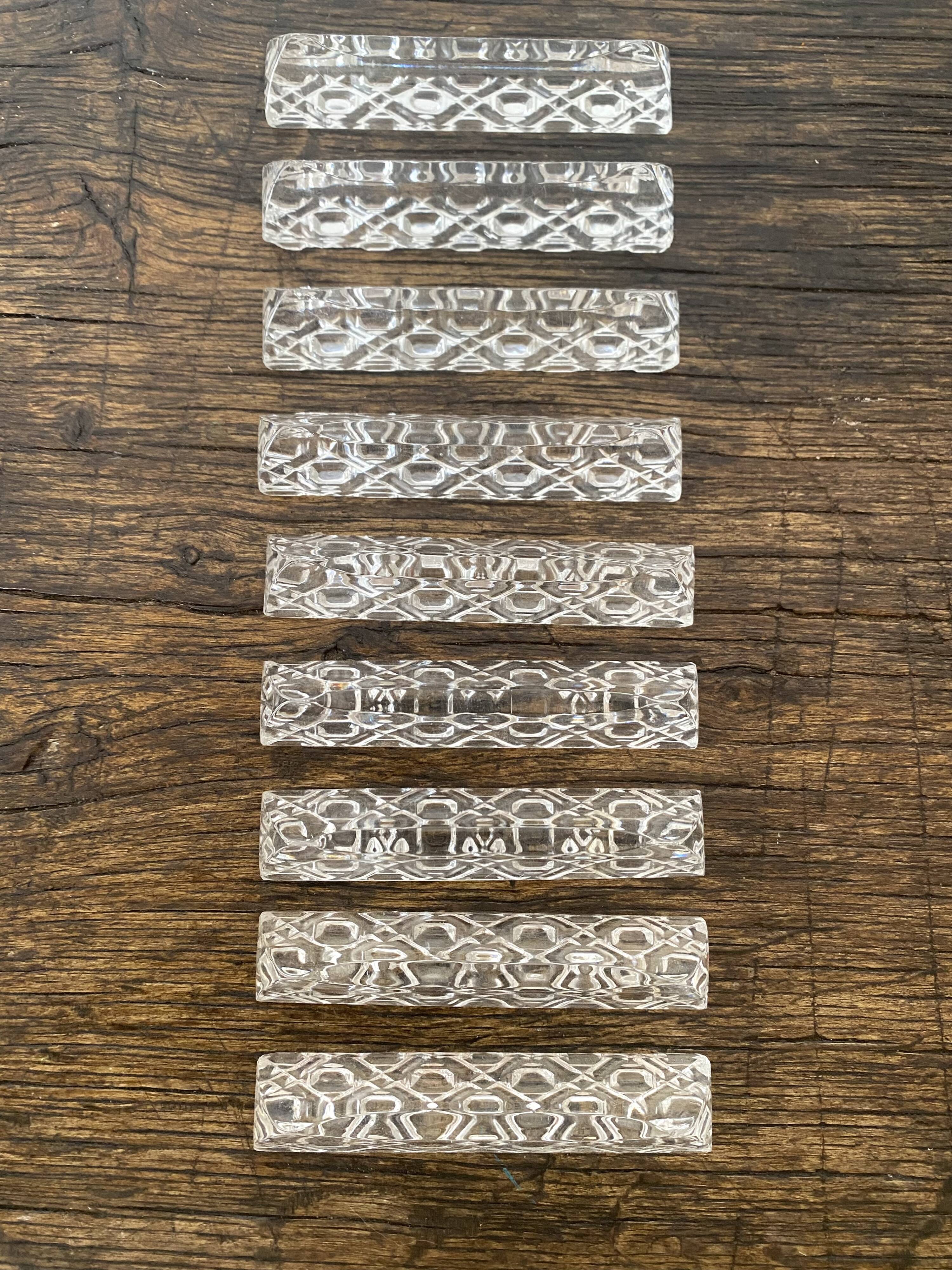 Set of antique glass knife holders
