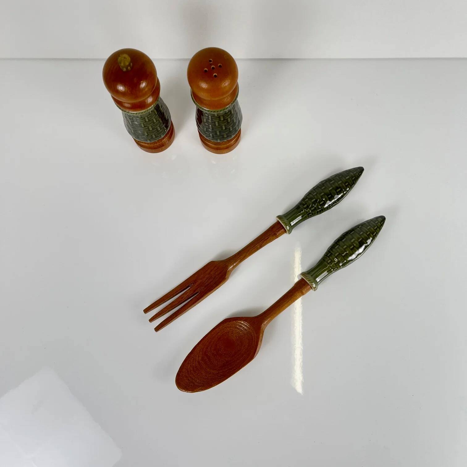Green ceramic salt and pepper shaker set and salad servers, 1970