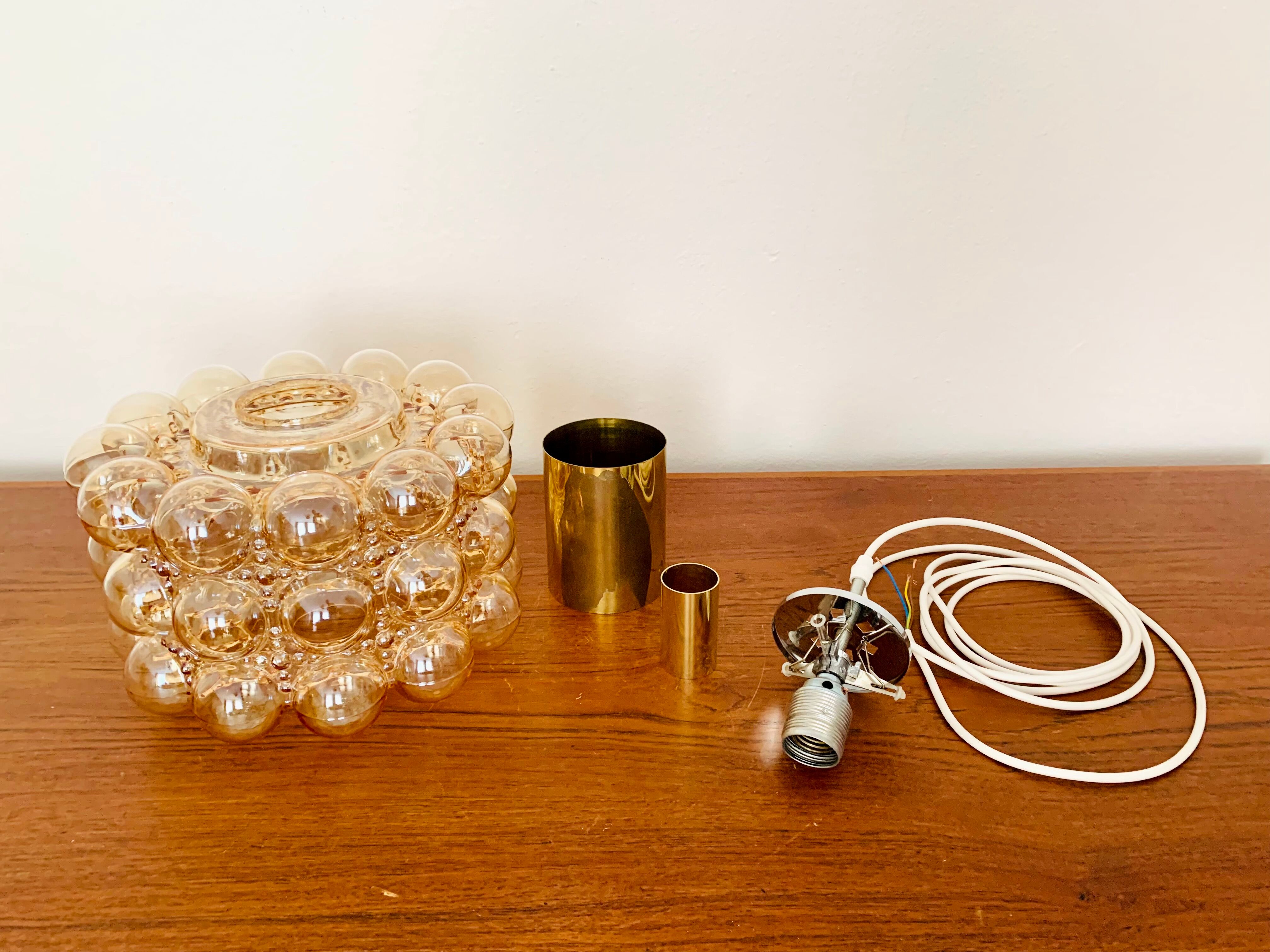 1 of 2 Large Bubble Glass Pendant Lamps by Helena Tynell for Glashütte Limb