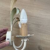 Vintage wrought iron wall sconce in the shape of a flower/leaf