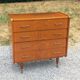 Vintage walnut varnished chest of drawers with 4 drawers from the 1960s.