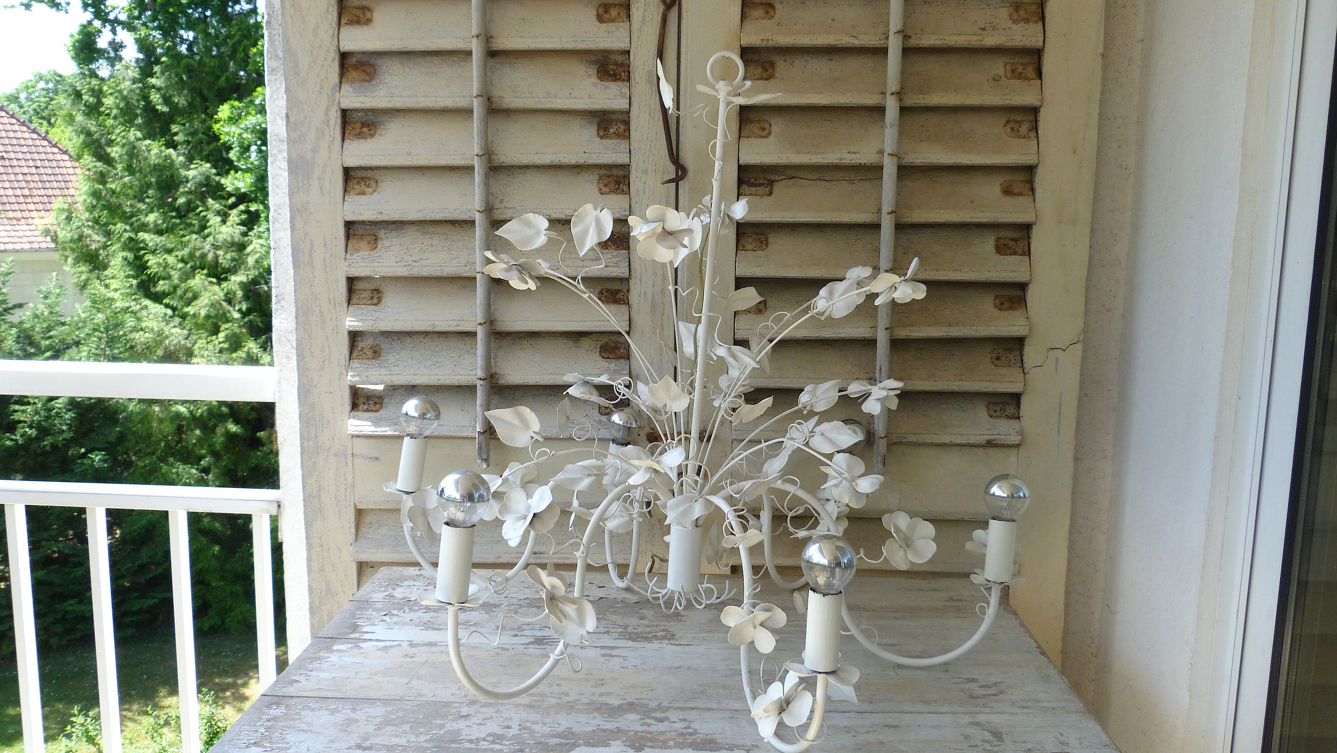 Vintage chandelier in painted metal decoration foliage and flowers