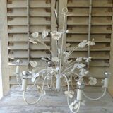 Vintage chandelier in painted metal decoration foliage and flowers