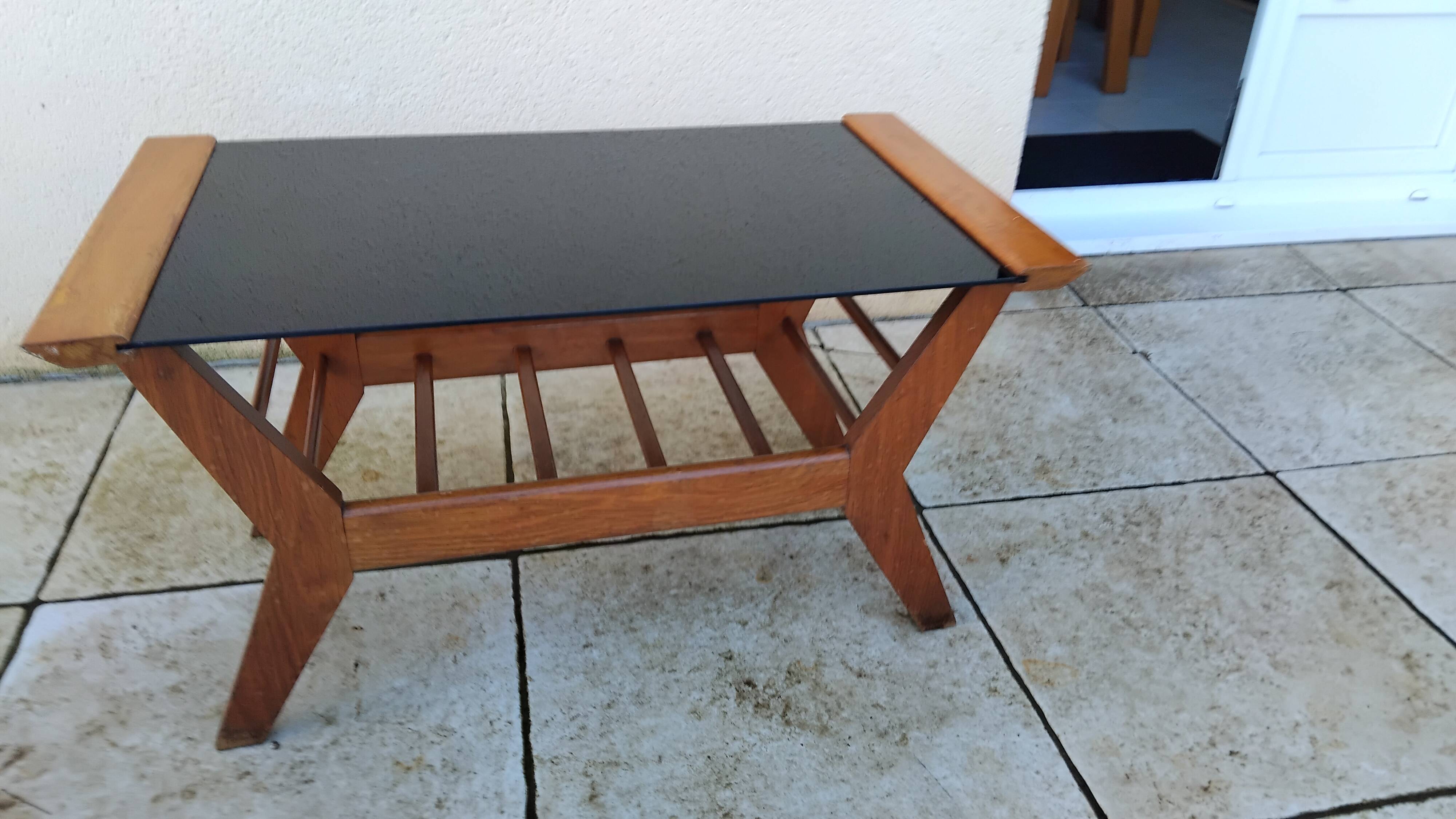 Vintage coffee table from the 1950s reconstruction, wood and glass.