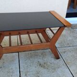 Vintage coffee table from the 1950s reconstruction, wood and glass.