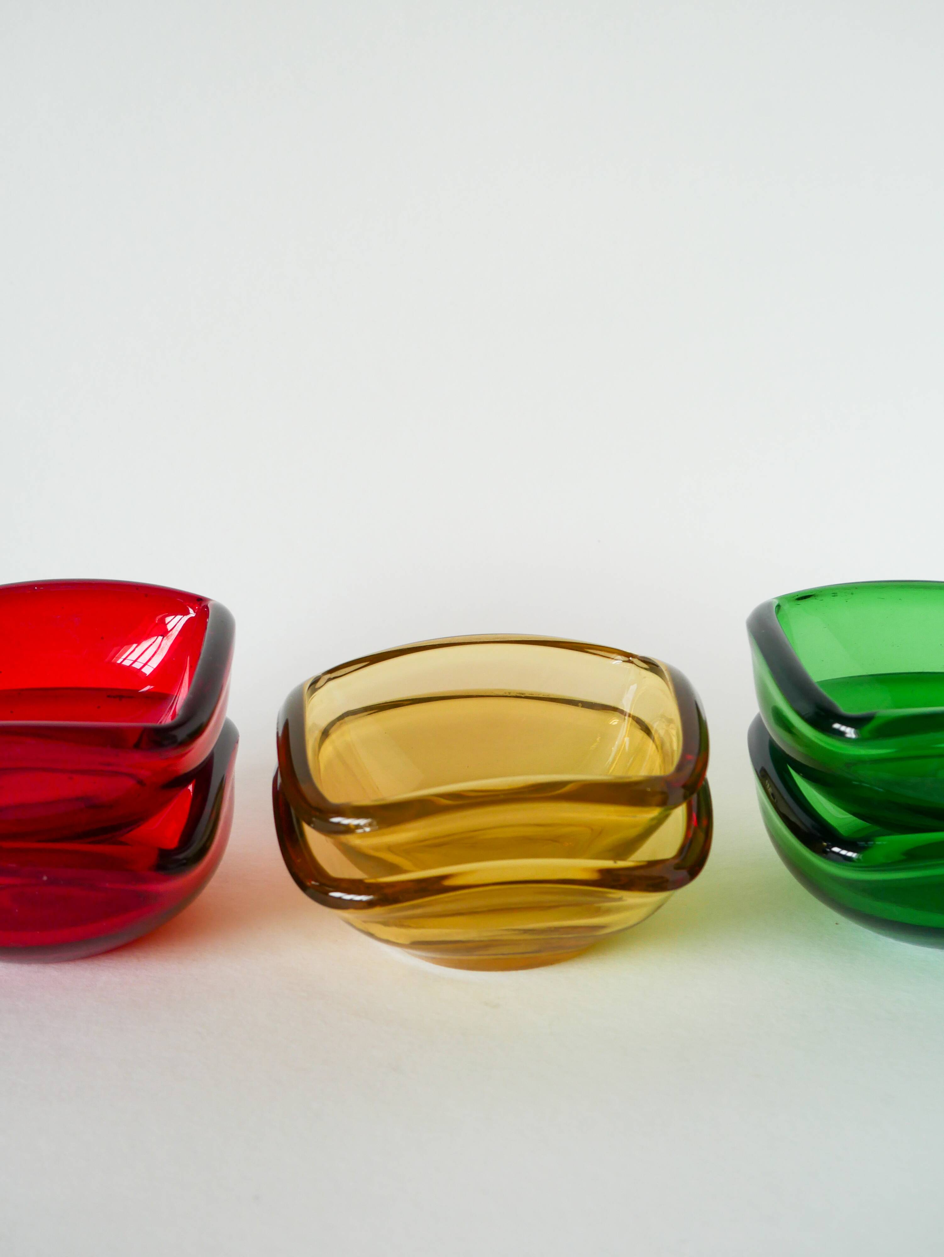 Superb pair of burgundy colored glass storage compartments, in the style of Murano, 1970. In excellent condition