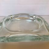 Coin holder shaped pocket emptier