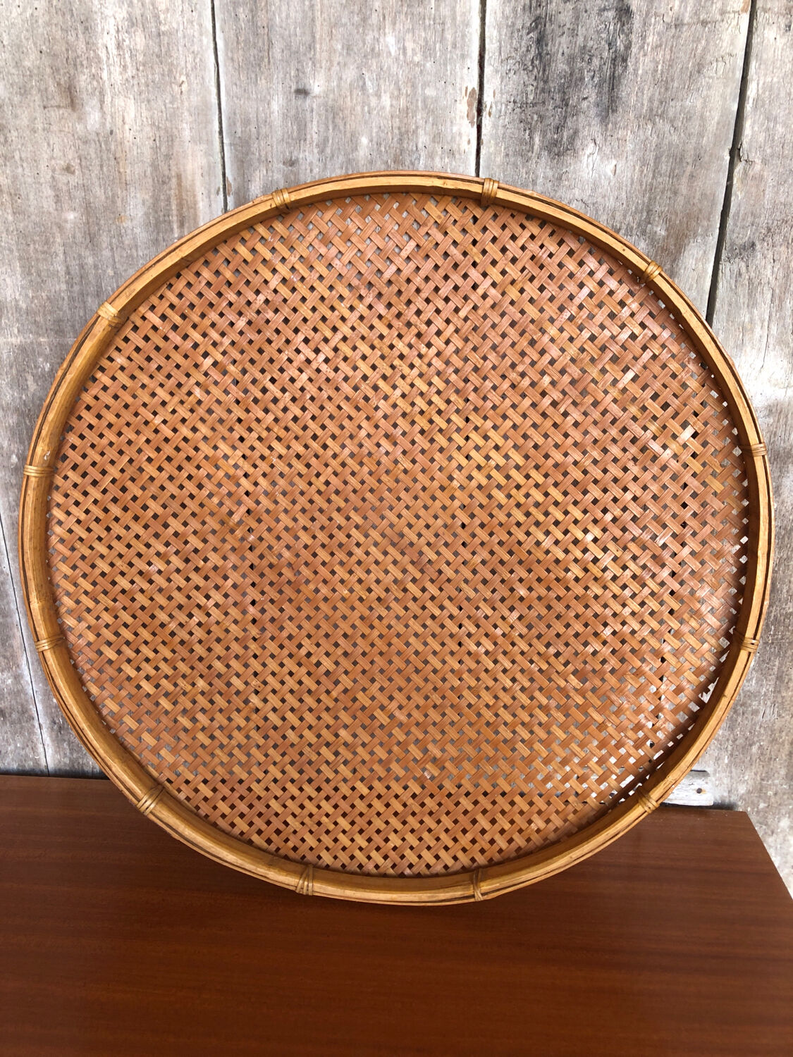 Old vintage braided wicker sieve