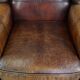 Fauteuil à oreilles en cuir de mouton